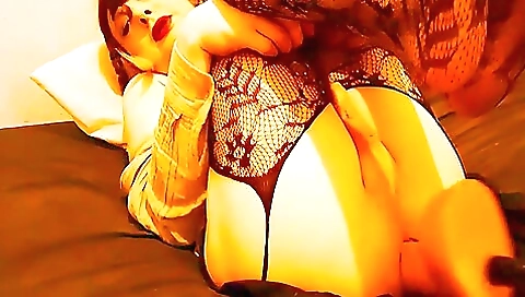 Busty brunette on top of a fuck machine gets pounded