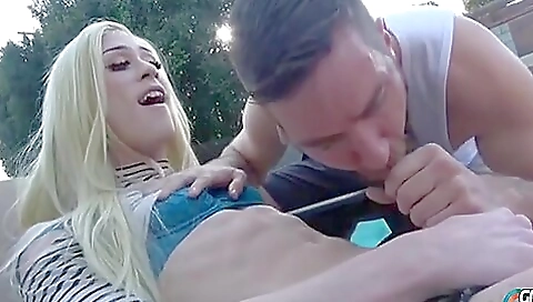 Tattooed blonde enjoys anal sex with her friend in the pool