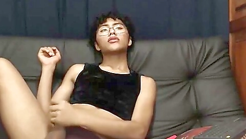 Cute brunette moans when she masturbates and touches the hole