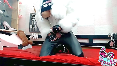 Busty babe with a fat booty is fucked by a latex dildo