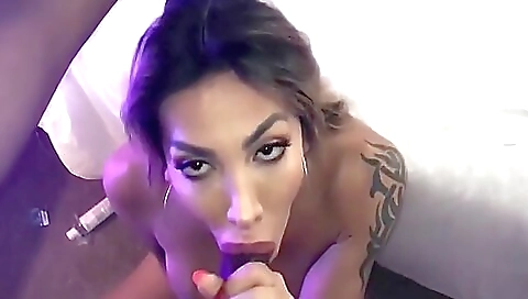 Tattooed brunette gets deepthroated in amateur porn video