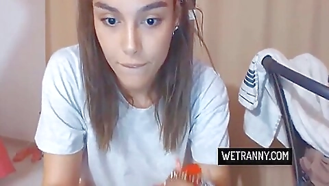 Amature brunette showing her big tits on the couch